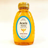 Plastic bottle of acacia honey
