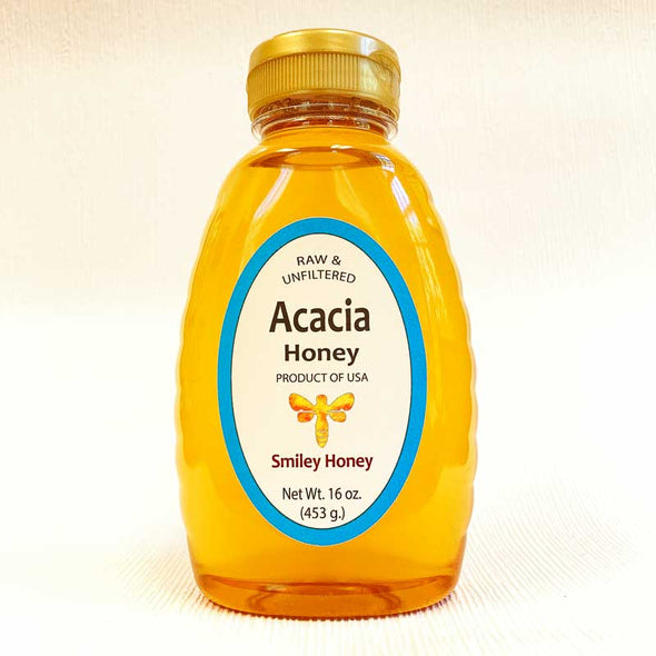 Plastic bottle of acacia honey