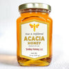 Glass jar of acacia honey